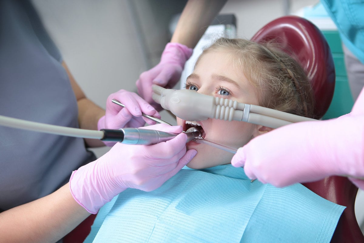 Girl Taking Dental Treatment with the Use of Nitrous Oxide | Solomon Kids Dentistry in Carnes & Knightsville, SC