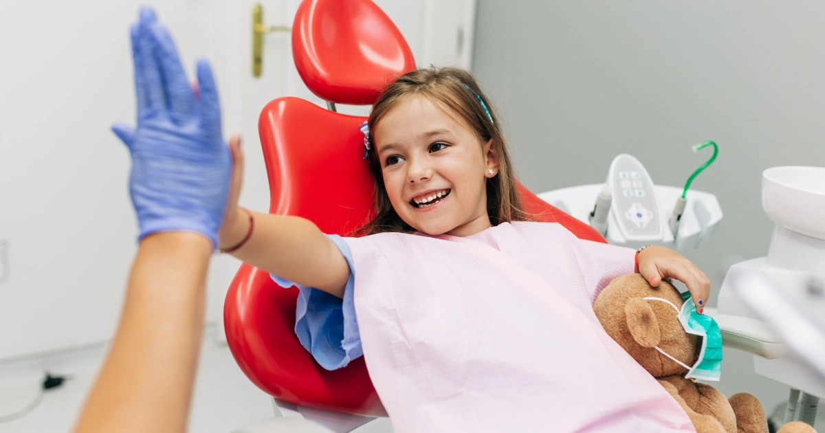 Child showing calm and smile after nitrous oxide sedation for dental treatment in Summerville, SC
