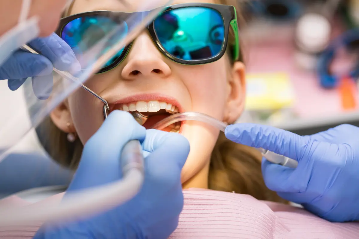 Child receiving dental fillings from a dentist in Summerville, SC