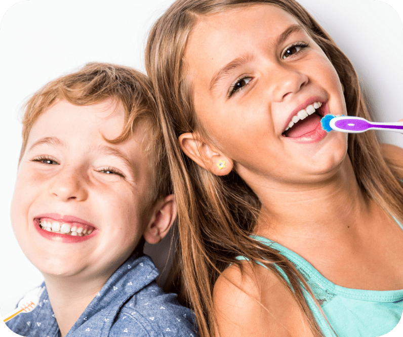 Two Children With Tooth Brush Photo | Solomon Kids Dentistry in Carnes & Knightsville, SC