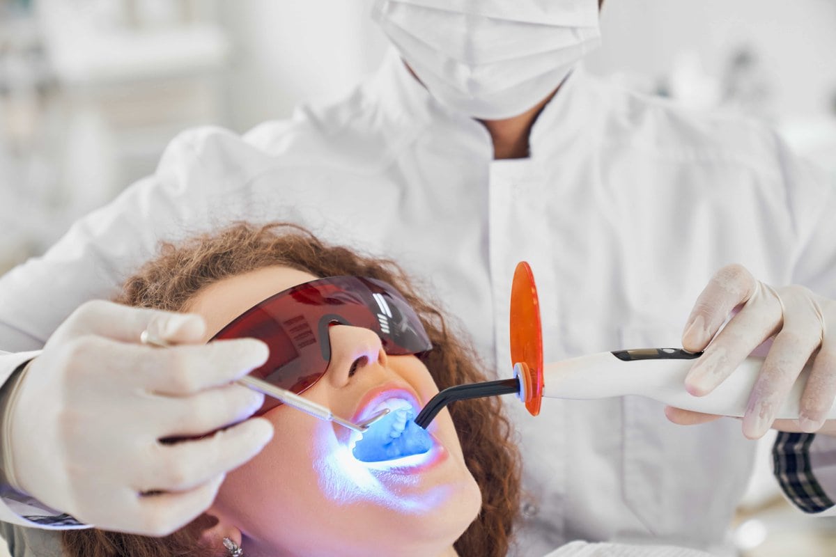 Young Woman Taking Laser Dental Treatment | Solomon Kids Dentistry in Carnes & Knightsville, SC